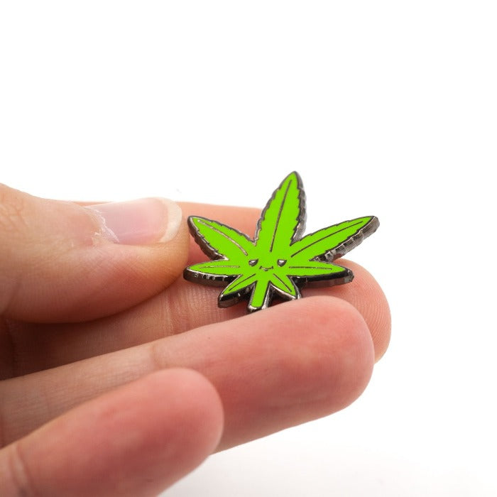 Stoned looking pot leaf in pin form!