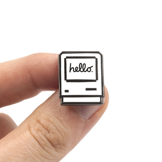 Personal computer icon with a "hello" script inside.